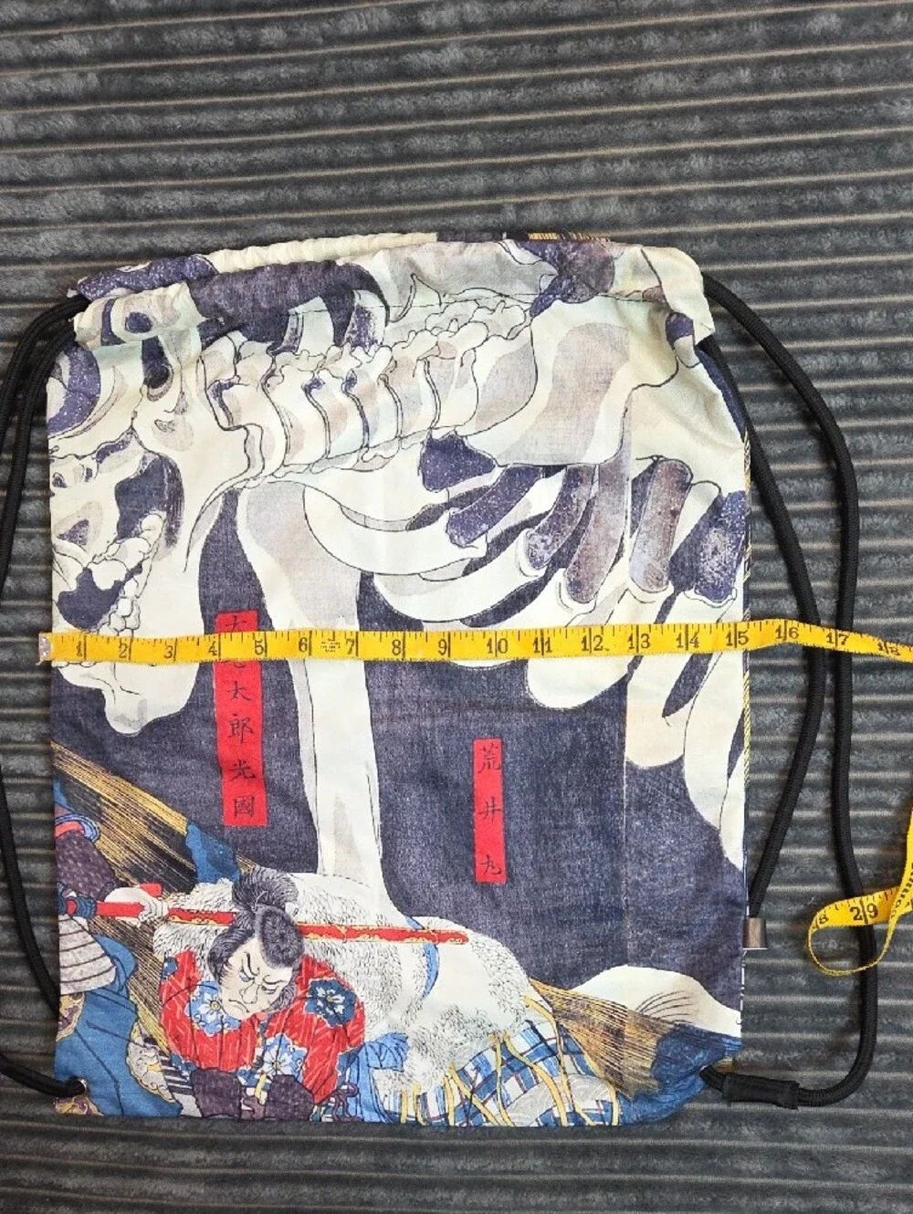 Skeleton Graphic Drawstring Backpack in Blue and White